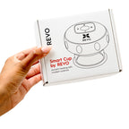 REVO Smart Cupping Massager instruction guide and product packaging