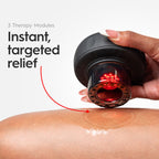 REVO cupping massager showing integrated red light during use